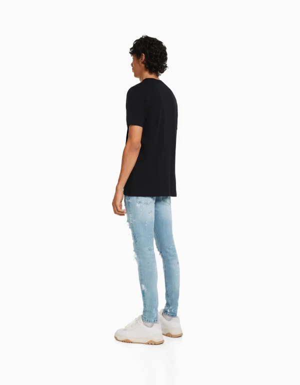 BERSHKA Jeans*Jean skinny déchirures taches de peinture Bleu lavé