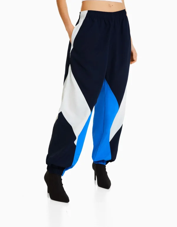 BERSHKA Pantalons*Pantalon jogger molleton effet nylon color block Bleu