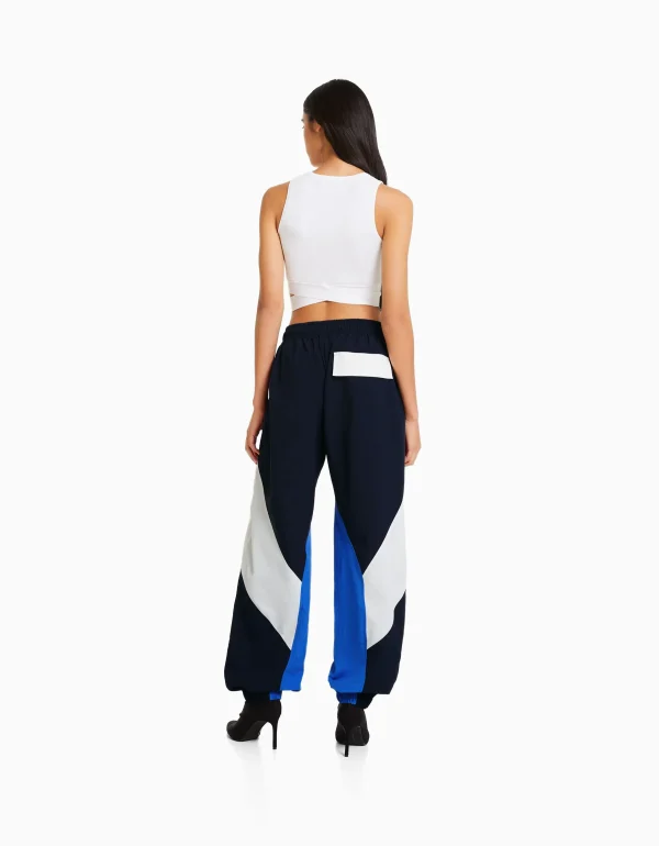 BERSHKA Vêtements*Pantalon jogger molleton effet nylon color block Bleu