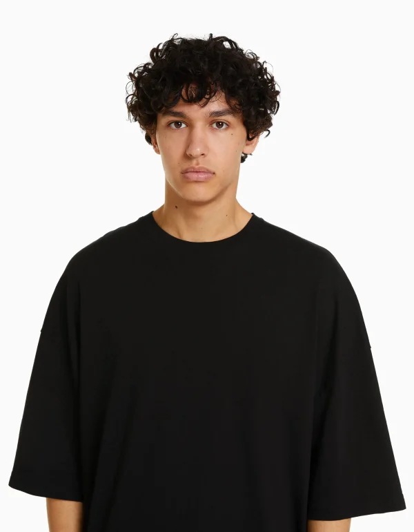 BERSHKA TEST*T-shirt oversize à manches courtes Noir