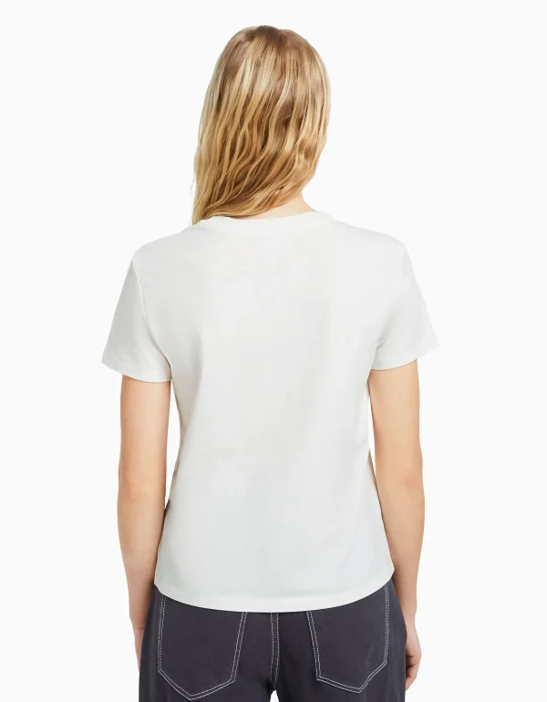 BERSHKA Tee-shirts*T-shirt regular imprimé graphique Blanc cassé